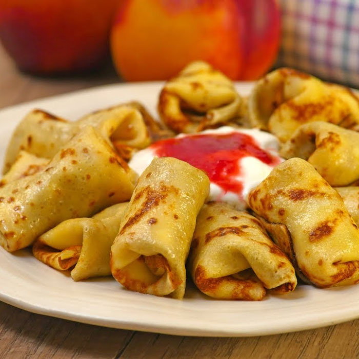 Clătite cu brânză și stafide, la cuptor